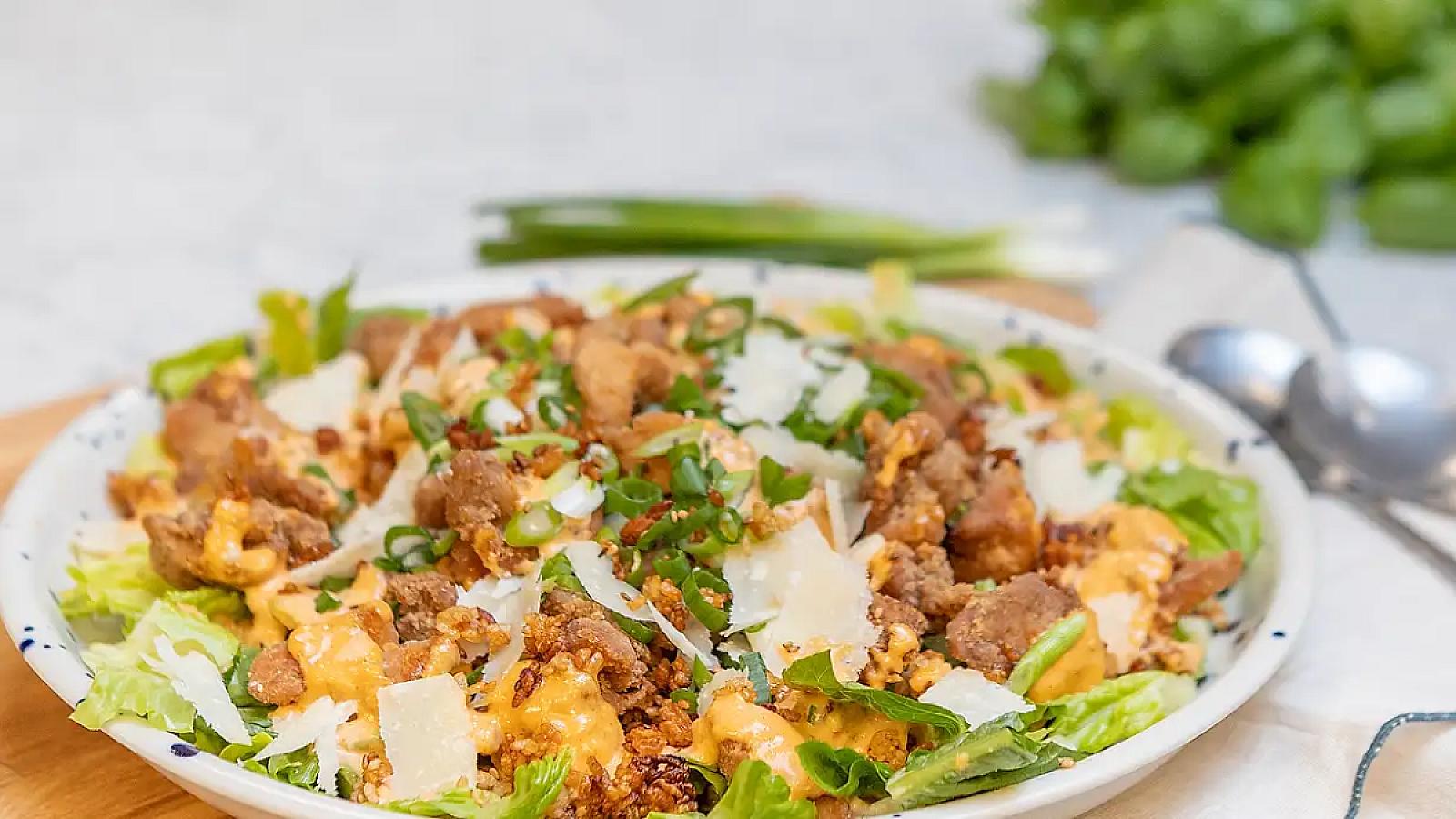 Caesar salad with Korean chicken and crispy rice